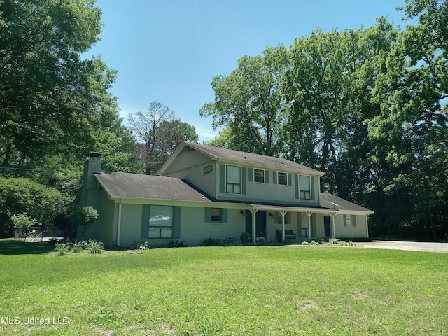 114 S 49th Hwy, Indianola, MS 38751 - view of front of home with a front yard and a chimney