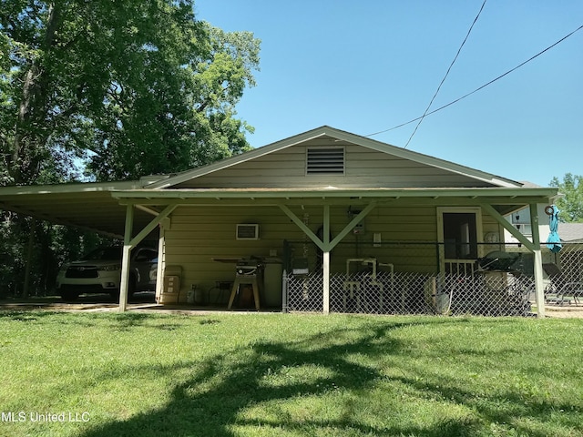 114 S 49th Hwy, Indianola, MS 38751 - rear view of property featuring an attached carport