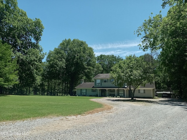 114 S 49th Hwy, Indianola, MS 38751 - view of front facade featuring gravel driveway and a front lawn