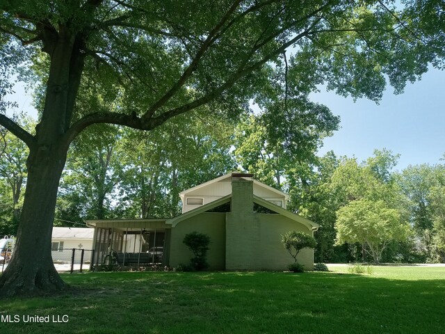 114 S 49th Hwy, Indianola, MS 38751 - view of side of property with a sunroom
