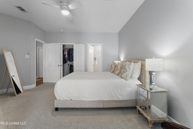 2252 Beach Dr Unit 606, Gulfport, MS 39507 - bedroom with carpet, ensuite bathroom, a spacious closet, a closet, and ceiling fan