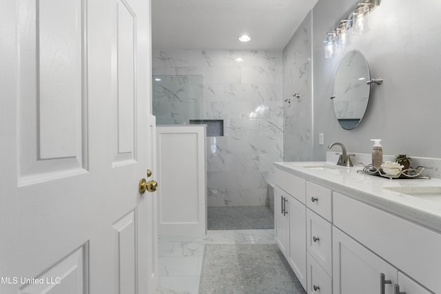 2252 Beach Dr Unit 606, Gulfport, MS 39507 - bathroom with marble finish flooring, a marble finish shower, double vanity, and recessed lighting