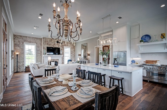 dining area featuring brick wall, crown molding, and dark hardwood / wood-style flooring