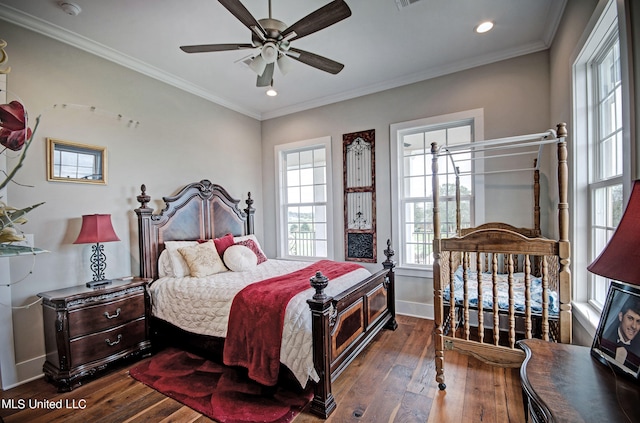 bedroom with multiple windows, ceiling fan, crown molding, and dark hardwood / wood-style flooring