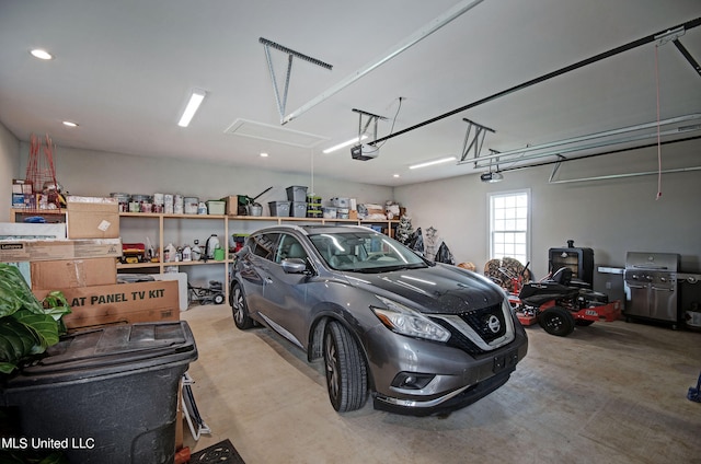 garage featuring a garage door opener