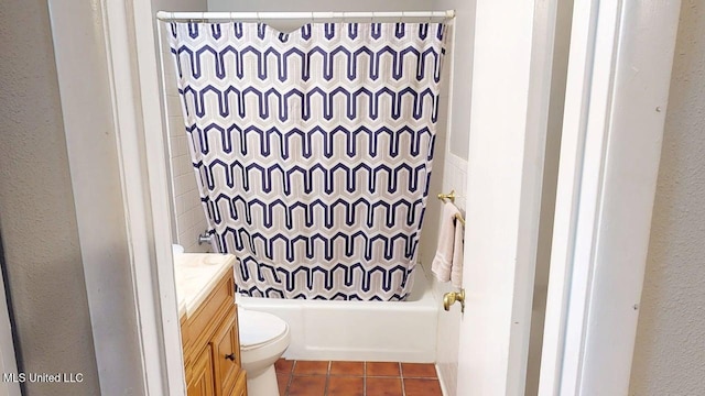 413 Kahler St Unit 27, Gulfport, MS 39507 - bathroom featuring tile patterned flooring, vanity, toilet, and shower / bath combo