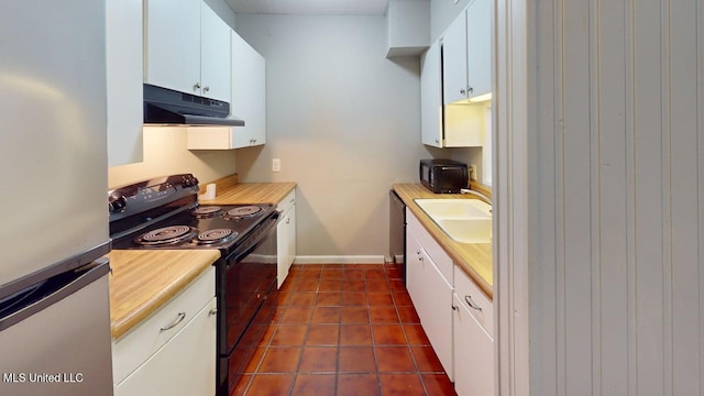 413 Kahler St Unit 27, Gulfport, MS 39507 - kitchen featuring black appliances, under cabinet range hood, a sink, light countertops, and white cabinets