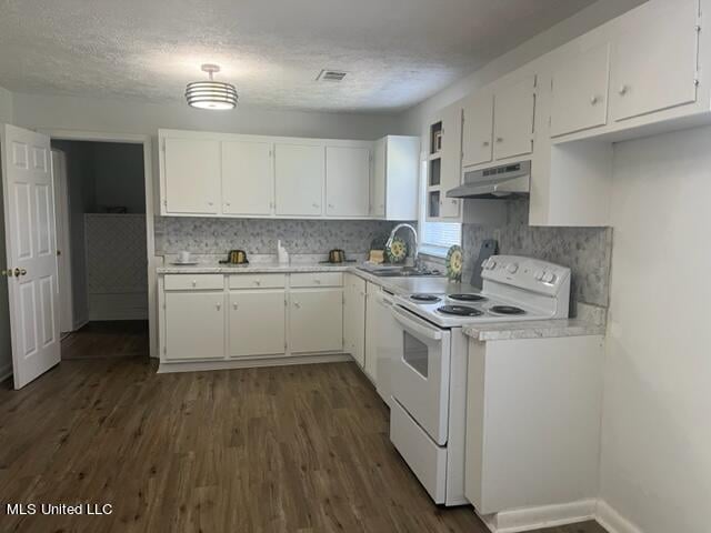 kitchen featuring dark wood-type flooring, white electric range, sink, white cabinets, and a textured ceiling