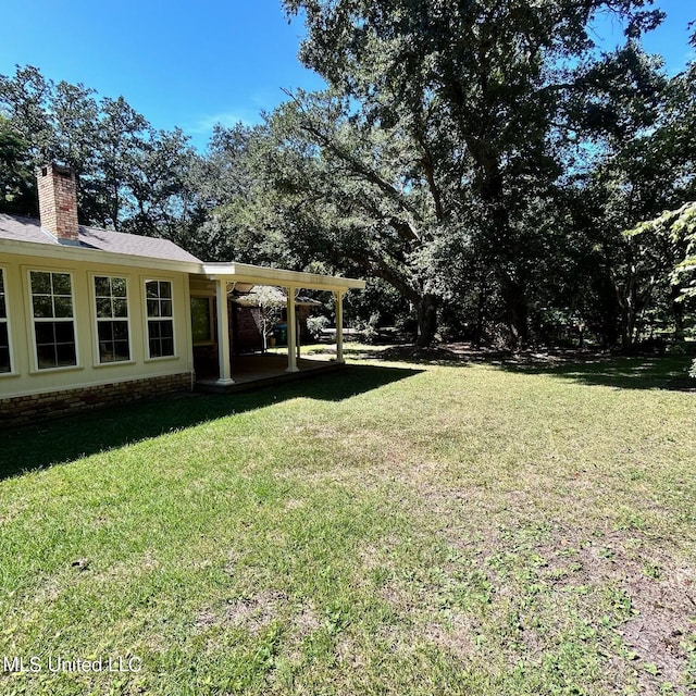 view of yard with a patio area