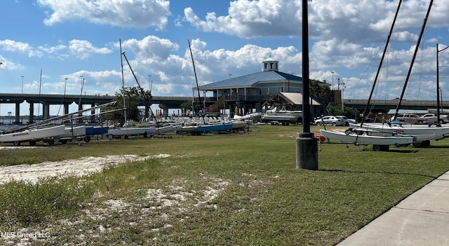 view of community featuring a yard