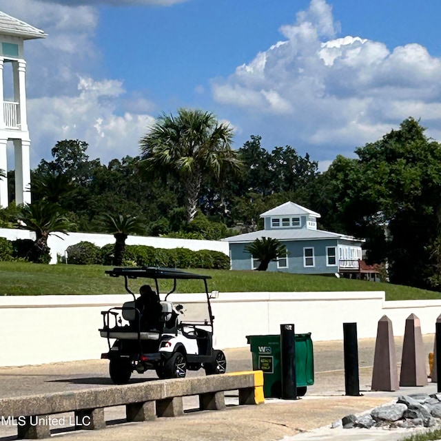 surrounding community featuring a lawn