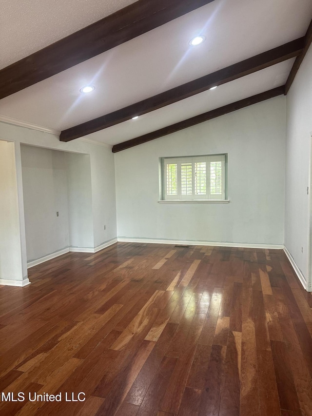 204 Fort Dr, Grenada, MS 38901 - empty room with recessed lighting, lofted ceiling with beams, baseboards, and dark wood-style flooring