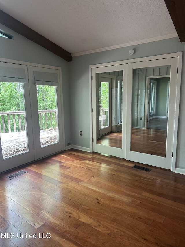 204 Fort Dr, Grenada, MS 38901 - entryway featuring wood-type flooring, plenty of natural light, and visible vents
