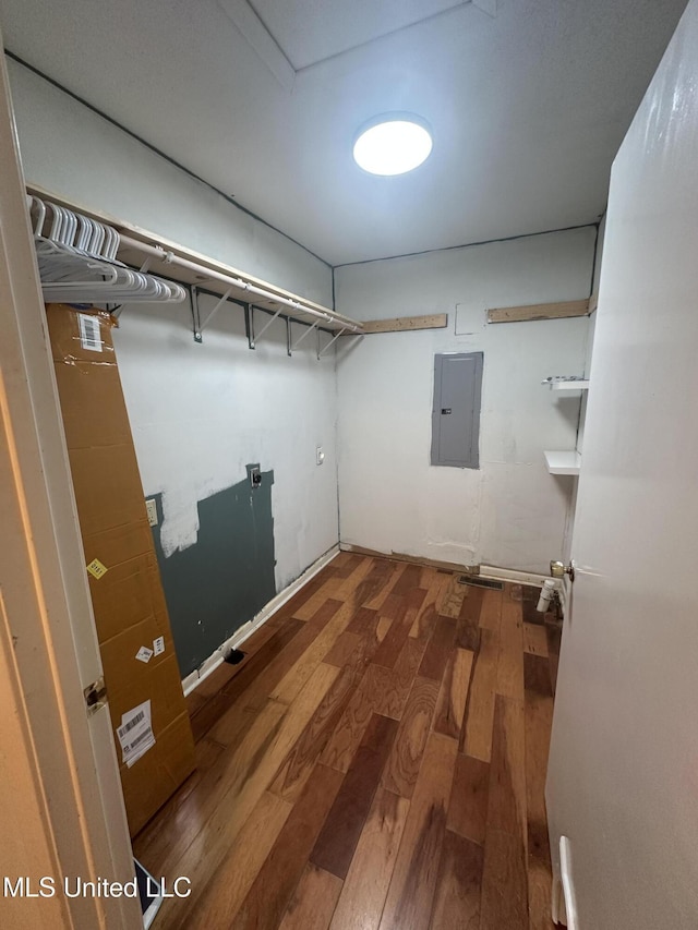 204 Fort Dr, Grenada, MS 38901 - interior space with electric panel, hardwood / wood-style flooring, visible vents, and laundry area