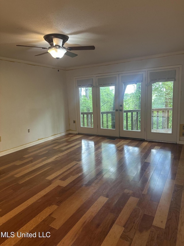 204 Fort Dr, Grenada, MS 38901 - unfurnished room featuring crown molding, hardwood / wood-style flooring, ceiling fan, french doors, and baseboards