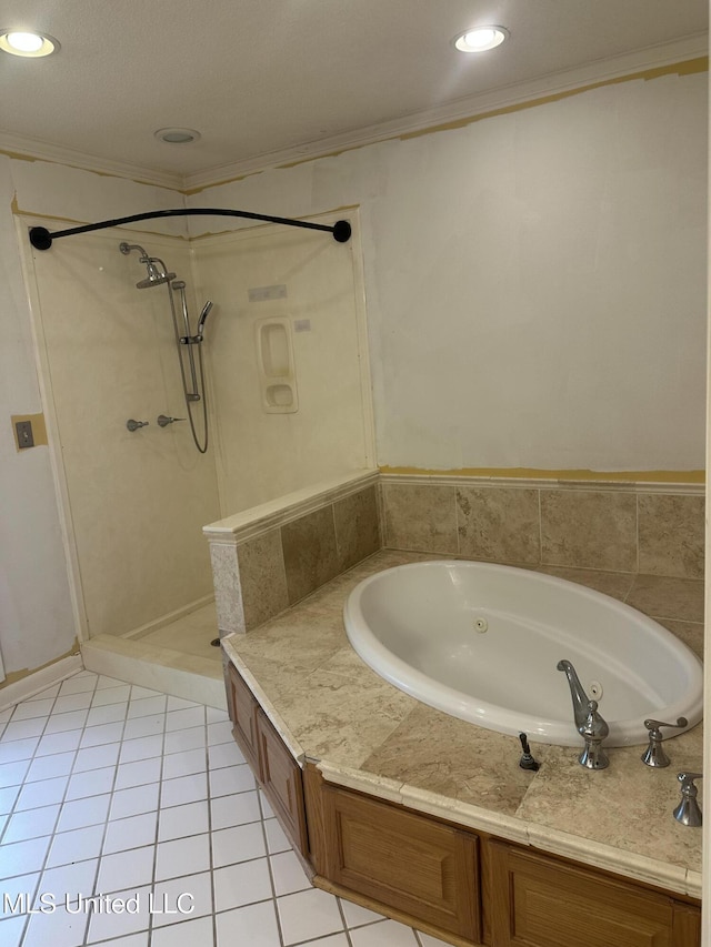 204 Fort Dr, Grenada, MS 38901 - bathroom with a shower stall, a jetted tub, crown molding, and tile patterned floors