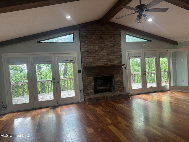204 Fort Dr, Grenada, MS 38901 - unfurnished living room featuring hardwood / wood-style floors, lofted ceiling with beams, ceiling fan, and french doors
