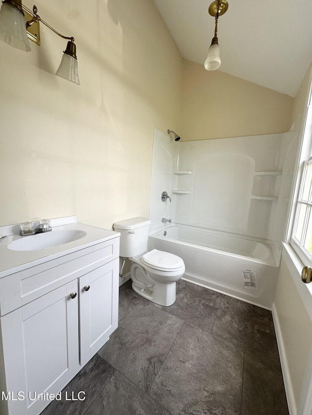 310 N Rankin St, Natchez, MS 39120 - bathroom featuring toilet, vanity, shower / bathtub combination, lofted ceiling, and baseboards