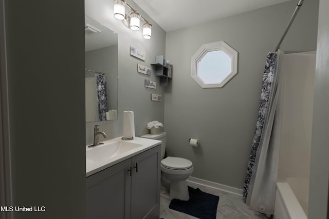 full bathroom with vanity, shower / bath combo with shower curtain, and toilet