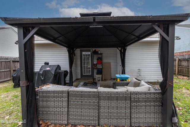 view of patio with a gazebo, outdoor lounge area, and area for grilling