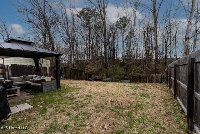 view of yard with a gazebo and an outdoor hangout area