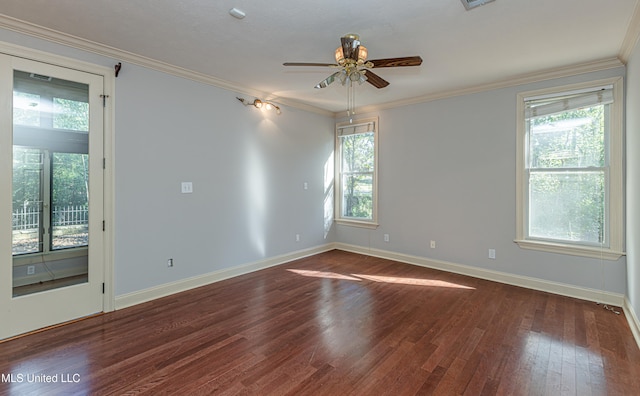 empty room with dark wood-type flooring, ceiling fan, and crown molding