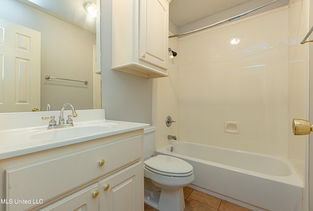 full bathroom with toilet, washtub / shower combination, vanity, and tile patterned floors