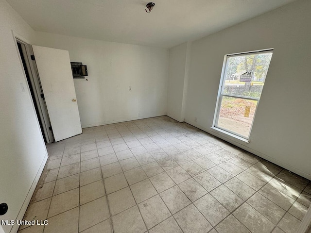 view of tiled spare room