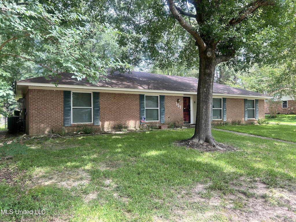 157 Fern Valley Rd, Brandon, MS 39042 - ranch-style house with brick siding, a front lawn, and roof with shingles