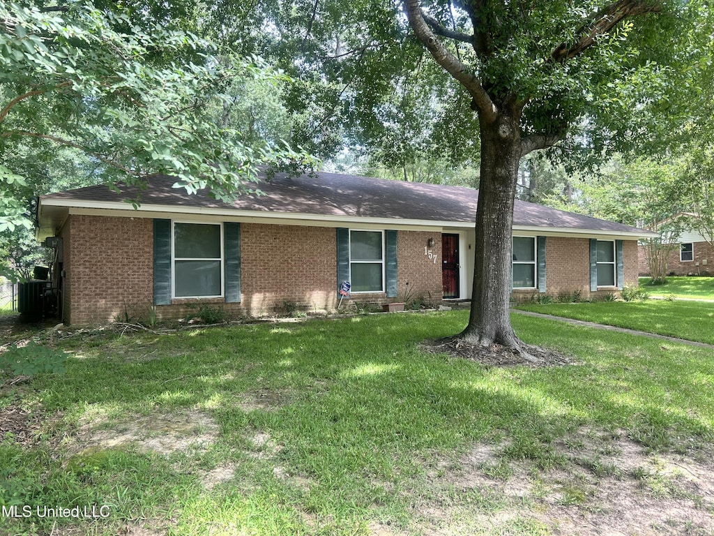 157 Fern Valley Rd, Brandon, MS 39042 - ranch-style home with brick siding, a front lawn, and a shingled roof