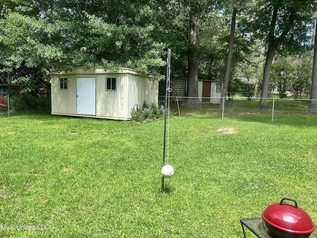 157 Fern Valley Rd, Brandon, MS 39042 - view of yard with a storage shed