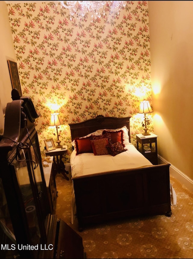 500 Franklin St, Natchez, MS 39120 - bedroom featuring wallpapered walls and baseboards
