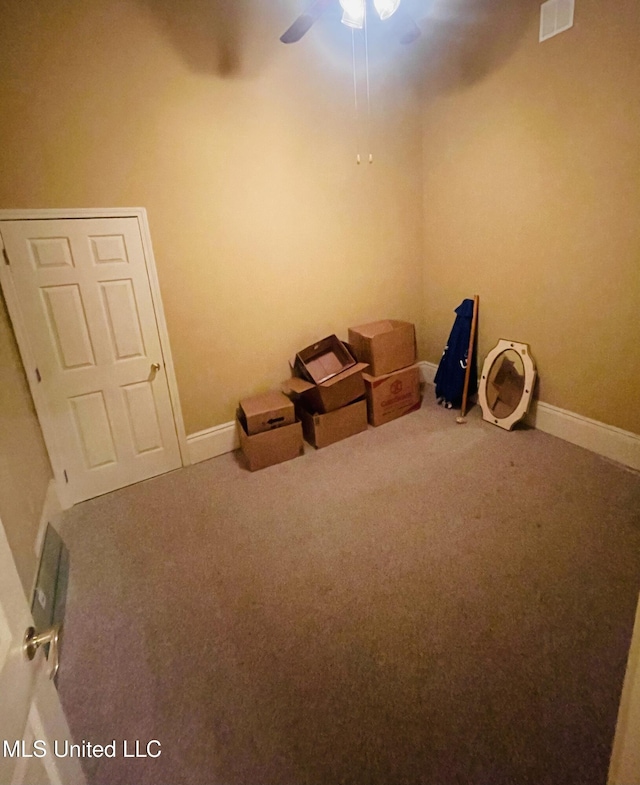 500 Franklin St, Natchez, MS 39120 - misc room featuring carpet flooring, a ceiling fan, and baseboards