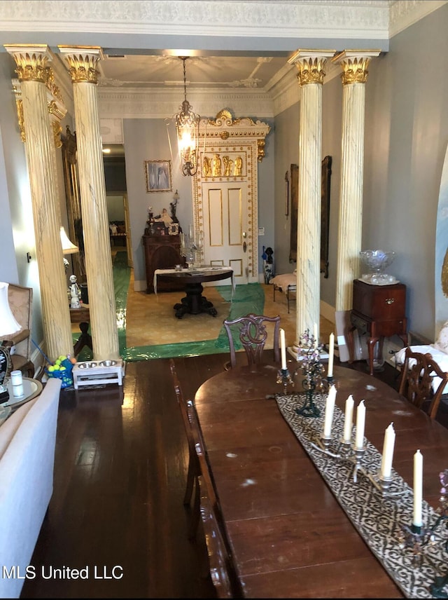 500 Franklin St, Natchez, MS 39120 - dining area featuring wood-type flooring, ornate columns, and ornamental molding