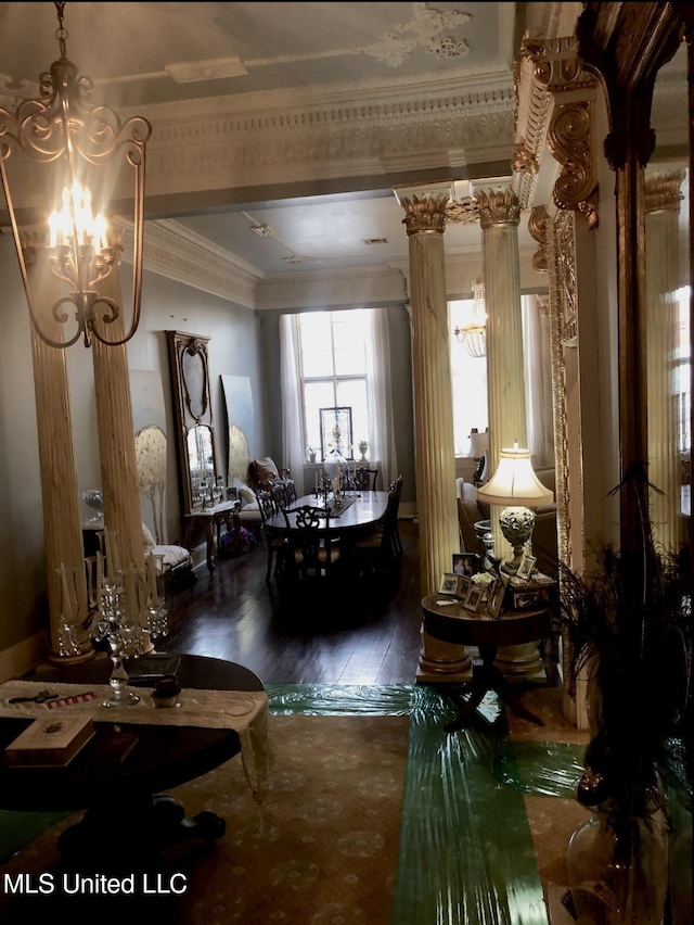 500 Franklin St, Natchez, MS 39120 - living room featuring ornamental molding, hardwood / wood-style floors, a chandelier, and baseboards