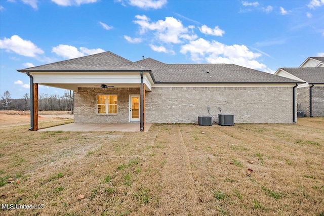 back of property with central AC, a patio area, ceiling fan, and a lawn