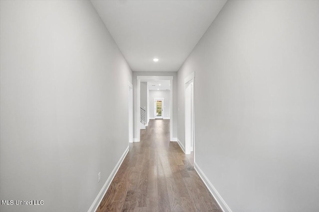 hallway featuring hardwood / wood-style flooring