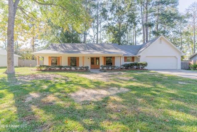 ranch-style home with a front lawn, covered porch, and a garage