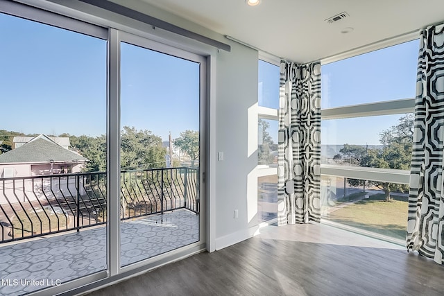 125 Miramar Ave, Biloxi, MS 39530 - entryway featuring plenty of natural light and hardwood / wood-style floors
