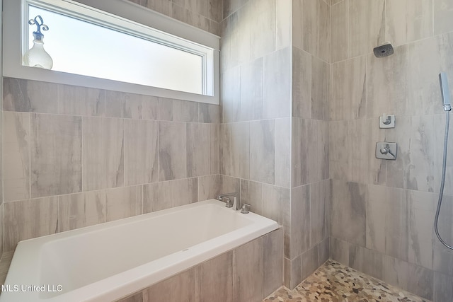 125 Miramar Ave, Biloxi, MS 39530 - bathroom with separate shower and tub