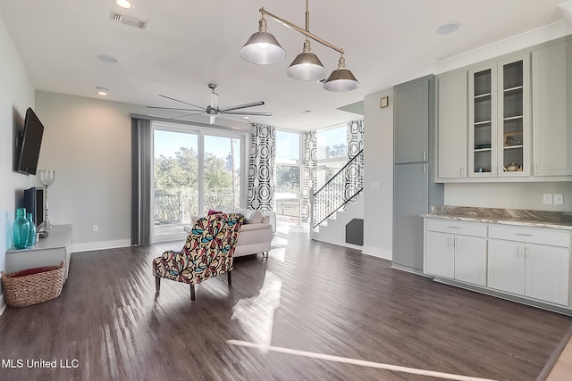 125 Miramar Ave, Biloxi, MS 39530 - living room with ceiling fan and dark hardwood / wood-style flooring