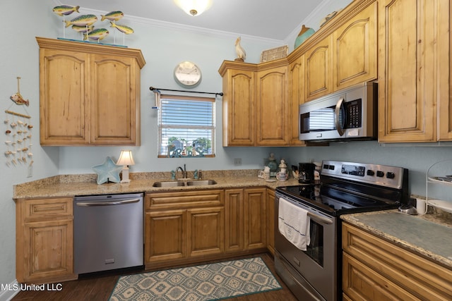 800 W Beach Blvd, Long Beach, MS 39560 - kitchen with appliances with stainless steel finishes, a sink, dark wood-style flooring, and ornamental molding