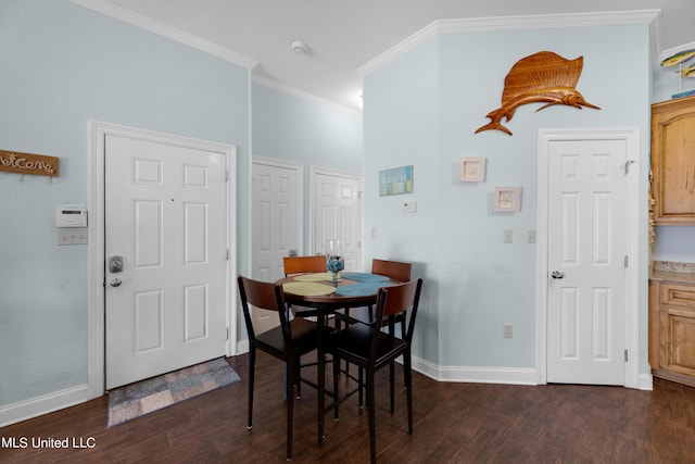 800 W Beach Blvd, Long Beach, MS 39560 - dining room featuring ornamental molding, dark wood-style floors, and baseboards