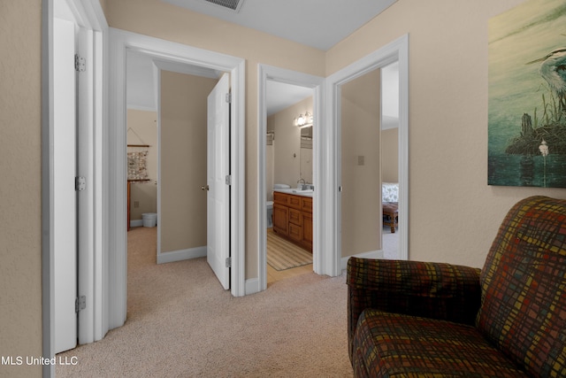 800 W Beach Blvd, Long Beach, MS 39560 - corridor featuring light carpet and baseboards
