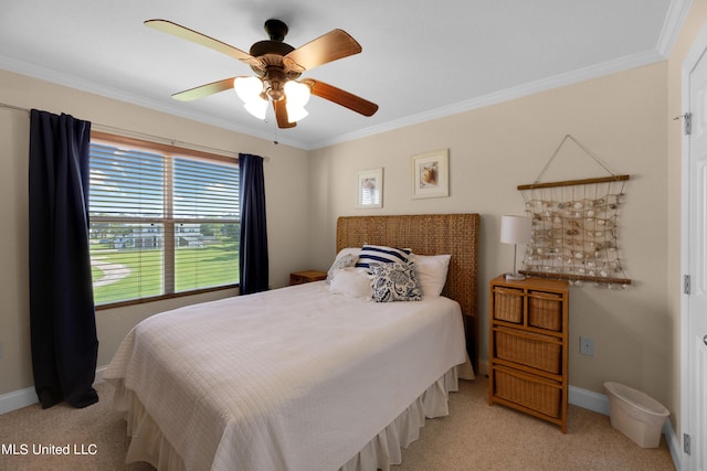 800 W Beach Blvd, Long Beach, MS 39560 - bedroom with carpet, crown molding, baseboards, and a ceiling fan