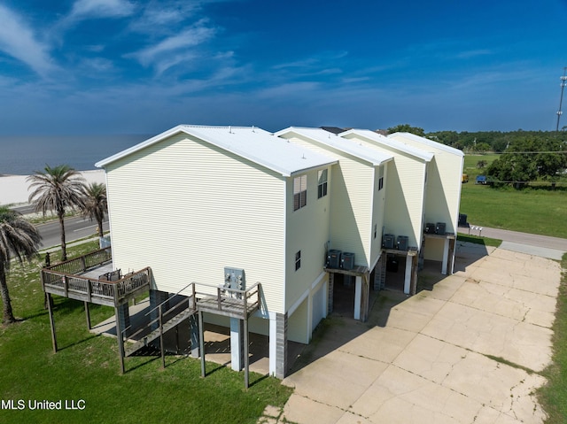 800 W Beach Blvd, Long Beach, MS 39560 - view of property exterior featuring a deck and a yard