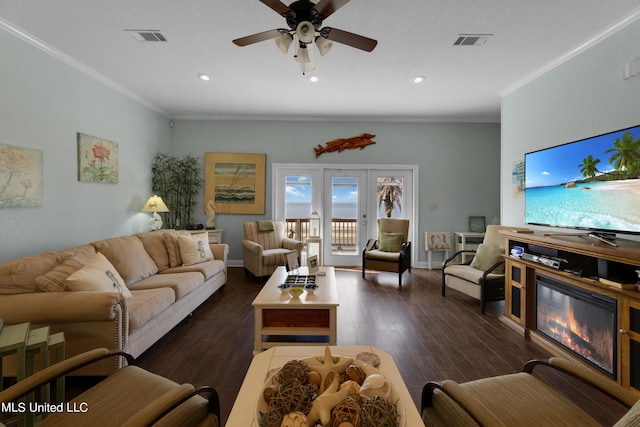 800 W Beach Blvd, Long Beach, MS 39560 - living room featuring crown molding, a ceiling fan, recessed lighting, wood finished floors, and a glass covered fireplace