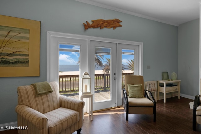 800 W Beach Blvd, Long Beach, MS 39560 - sitting room featuring crown molding, dark wood-type flooring, baseboards, a water view, and french doors