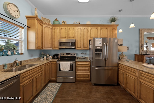 800 W Beach Blvd, Long Beach, MS 39560 - kitchen featuring appliances with stainless steel finishes, a sink, healthy amount of natural light, light stone countertops, and crown molding