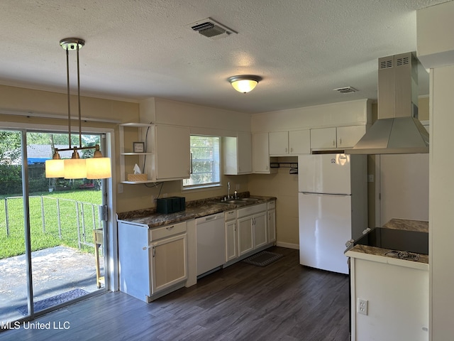11086 E Taylor Rd, Gulfport, MS 39503 - kitchen featuring white appliances, exhaust hood, dark countertops, white cabinets, and a textured ceiling